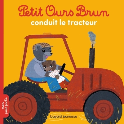 Petit ours brun conduit le tracteur - Image principale