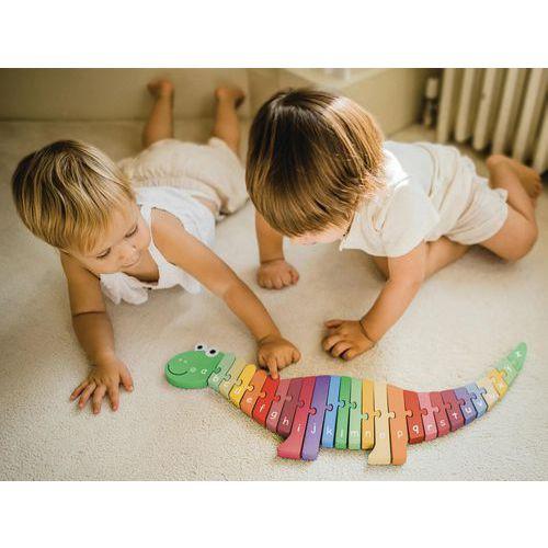 Illustration de : Puzzle alphabet dinosaure - Orange Tree